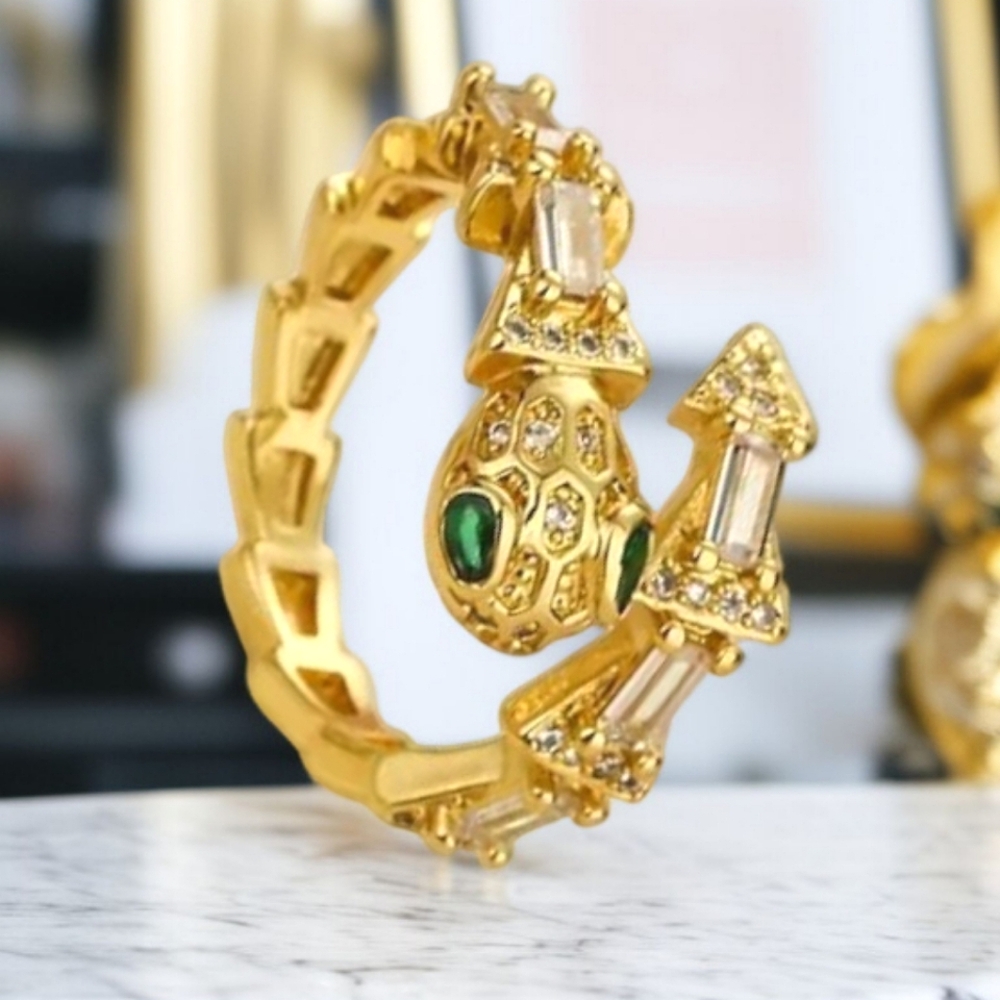 Gold and Green Jewelry Piece